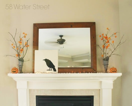 DIY stenciled Halloween mantel art using the Crow Craft Stencil on a canvas. http://www.cuttingedgestencils.com/crow-stencil-halloween-accent-pillows-trick-or-treat-totes.html