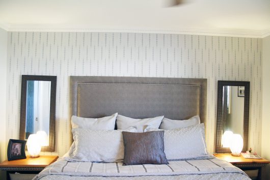 A DIY stenciled bedroom accent wall using the Beads Allover Stencil, a geometric wall pattern, from Cutting Edge Stencils. http://www.cuttingedgestencils.com/beads-wall-stencil-pattern.html