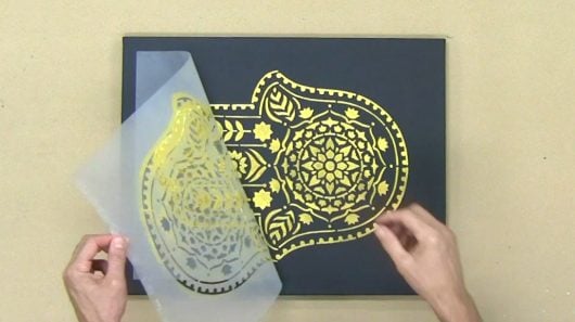 Learn how to stencil on canvas using the Hamsa Hand, a Mandala stencil pattern, from Cutting Edge Stencils. http://www.cuttingedgestencils.com/hamsa-hand-mandala-stencil.html