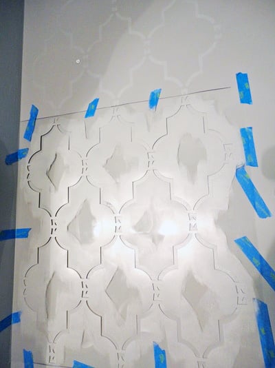 Stenciling an accent wall with the Marrakech Trellis Stencil, a Moroccan wall pattern, from Cutting Edge Stencils. http://www.cuttingedgestencils.com/moroccan-stencil-marrakech.html
