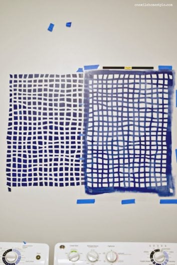 Stenciling an accent wall in a laundry room using the Mesh Allover Stencil, a popular geometric grid wall pattern, from Cutting Edge Stencils in Glidden Rich Navy and Silvery Moonlight. http://www.cuttingedgestencils.com/mesh-contemporary-stencil-grid-pattern.html 