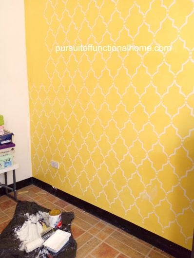 Stenciling an accent wall in yellow using the Marrakech Trellis Allover Stencil, a popular Moroccan wall pattern, from Cutting Edge Stencils. http://www.cuttingedgestencils.com/moroccan-stencil-marrakech.html