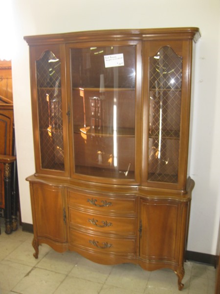 A brown wooden hutch before its stenciled makeover. http://www.cuttingedgestencils.com/beads-craft-stencils-DIY-home-decor.html