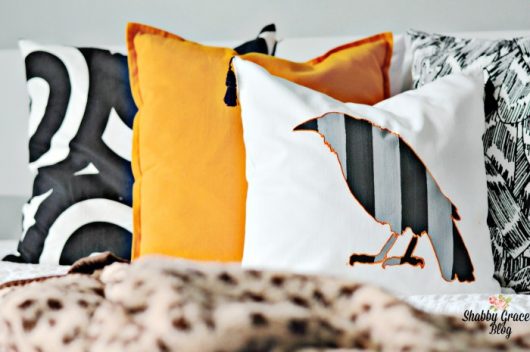 A DIY stenciled Halloween accent pillow using the Crow Stencil from Cutting Edge Stencils. http://www.cuttingedgestencils.com/crow-stencil-design-halloween-home-decor-diy-pillow-kit.html