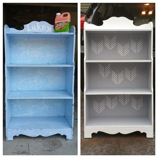 A stenciled and painted bookcase using the Drifting Arrows Stencil, a geometric furniture pattern, from Cutting Edge Stencils. http://www.cuttingedgestencils.com/drifting-arrows-stencil-pattern-diy-decor.html