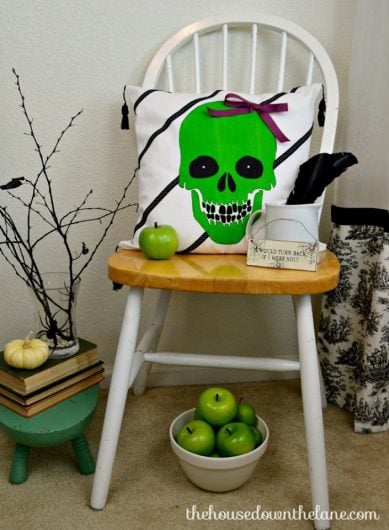 A DIY Halloween stenciled accent pillow using the Skull #3 Accent Pillow Stencil Kit from Cutting Edge Stencils. http://www.cuttingedgestencils.com/skull-throw-pillows-halloween-diy-home-decor.html