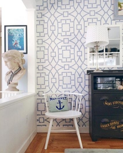 A blue and white stenciled accent wall using the Tea House Trellis, a geometric wall pattern, from Cutting Edge Stencils. http://www.cuttingedgestencils.com/tea-house-trellis-allover-stencil-pattern.html