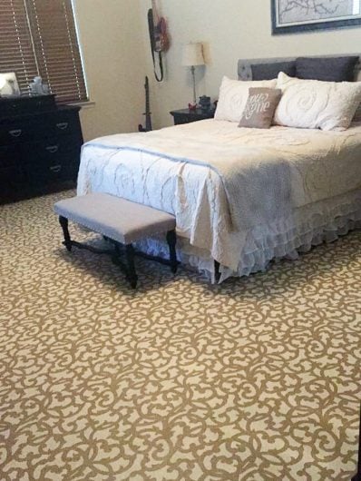 A DIY stenciled bedroom floor using the Venetian Scroll Allover pattern from Cutting Edge Stencils. http://www.cuttingedgestencils.com/venetian-scroll-allover-stencil-pattern.html