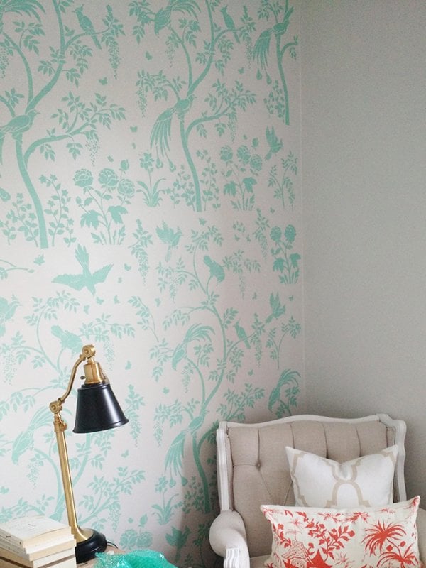 An accent wall using the Chinoiserie Birds and Berries Wall Mural Panel from Cutting Edge Stencils for a wallpaper look, painted in Benjamin Moore's Key Largo Green. http://www.cuttingedgestencils.com/chinoiserie-stencil-mural-wall-design-wallpaper.html