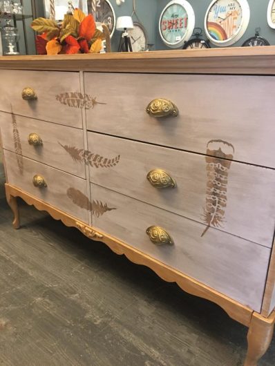 A DIY rustic yet glam stenciled dresser using the Feathers 6 piece Stencil Kit from Cutting Edge Stencils in metallic gold. http://www.cuttingedgestencils.com/feathers-stencil-design-boho-tribal-indian-feather-stencils.html
