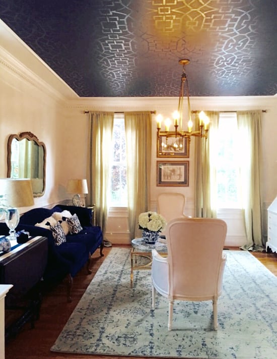 A sophisticated living room with a black stenciled ceiling using the Tea House Trellis Allover Stencil from Cutting Edge Stencils. http://www.cuttingedgestencils.com/tea-house-trellis-allover-stencil-pattern.html