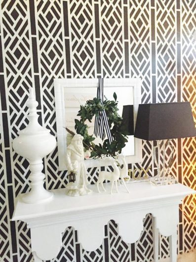 A DIY stenciled black and white bold entyrway using the Lattice Allover Stencil designed by Kathy Peterson from Cutting Edge Stencils. http://www.cuttingedgestencils.com/lattice-stencil-pattern-kathy-peterson.html