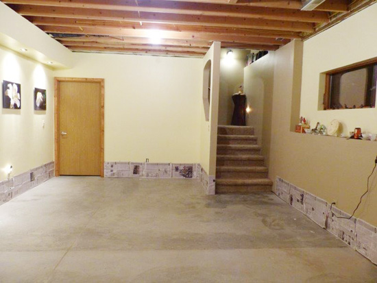 A shot of a basement before its stenciled floor makeover. http://www.cuttingedgestencils.com/paisley-allover-stencil.html 