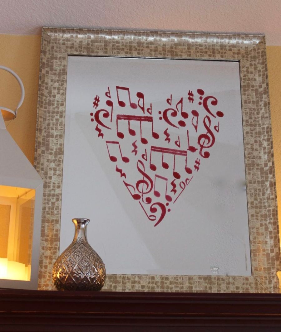 A DIY stenciled mirror for Valentine's Day using the Musical Notes Allover Stencil from Cutting Edge Stencils in heart shape. http://www.cuttingedgestencils.com/musical-notes-stencil-wall-design.html