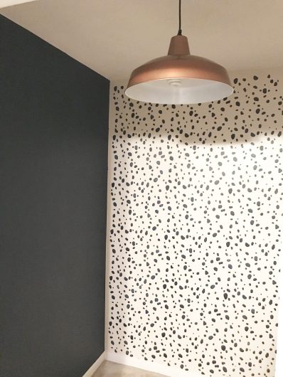 A DIY stenciled master bedroom closet accent wall using the Dalmatian Spots Allover Stencil from Cutting Edge Stencils. http://www.cuttingedgestencils.com/dalmatian-spots-stencil-dots-wallpaper-pattern.html