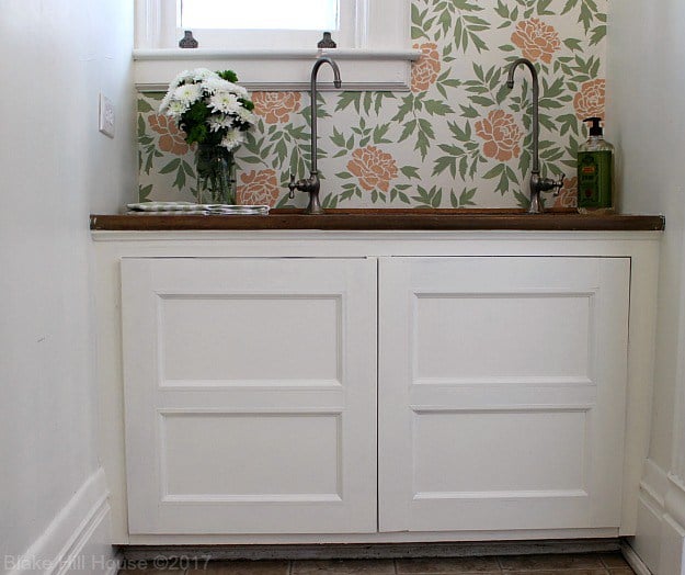 A DIY floral stenciled butler's pantry accent wall using the Japanese Peonies Allover Stencil from Cutting Edge Stencils. http://www.cuttingedgestencils.com/japanese-peonies-floral-stencil-pattern.html