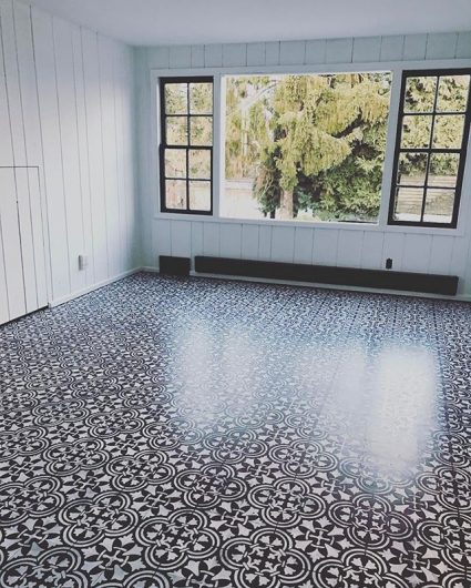 A black and white DIY stenciled floor using the Augusta Tile Stencil from Cutting Edge Stencils. http://www.cuttingedgestencils.com/augusta-tile-stencil-design-patchwork-tiles-stencils.html