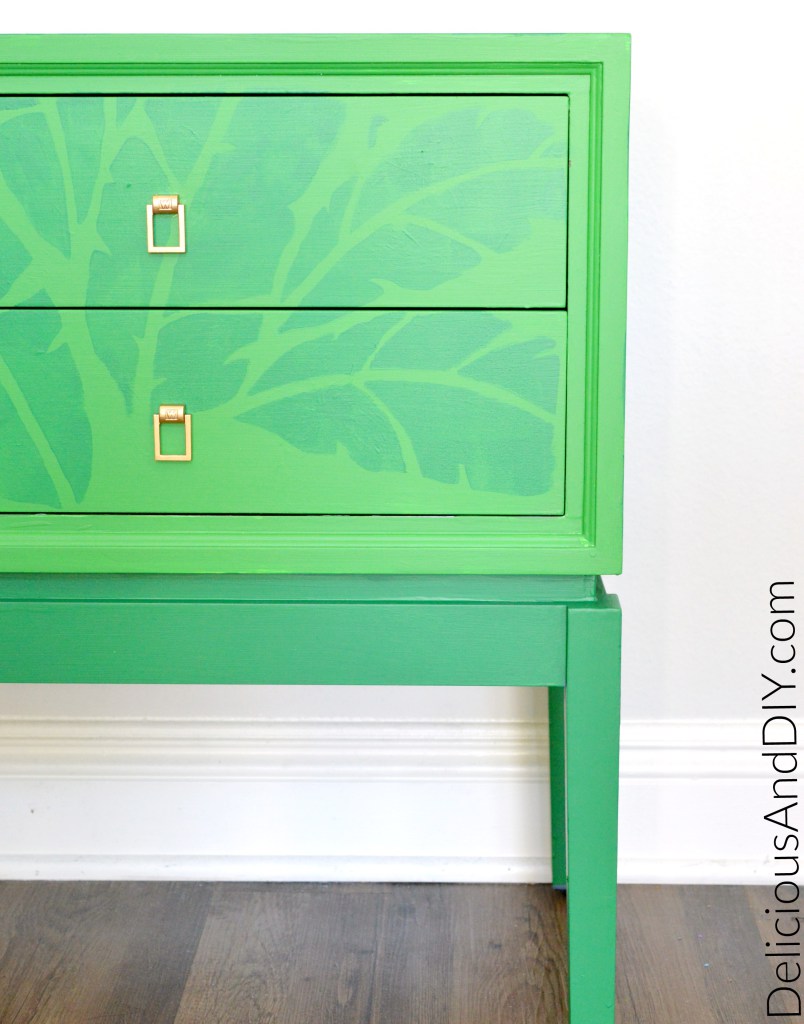 A DIY stenciled green side table using the Banana Leaf Allover Stencil from Cutting Edge Stencils. http://www.cuttingedgestencils.com/banana-leaf-stencil-tropical-wallpaper-palm-leaves-print.html