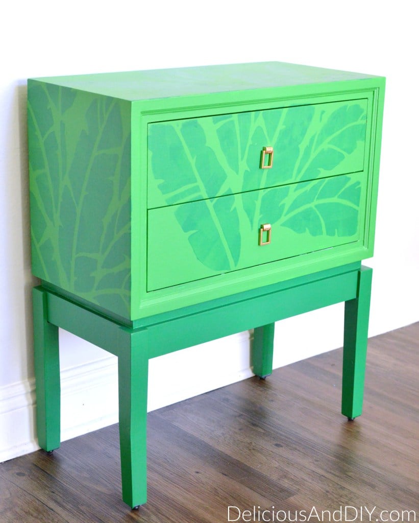 A DIY stenciled green side table using the Banana Leaf Allover Stencil from Cutting Edge Stencils. http://www.cuttingedgestencils.com/banana-leaf-stencil-tropical-wallpaper-palm-leaves-print.html