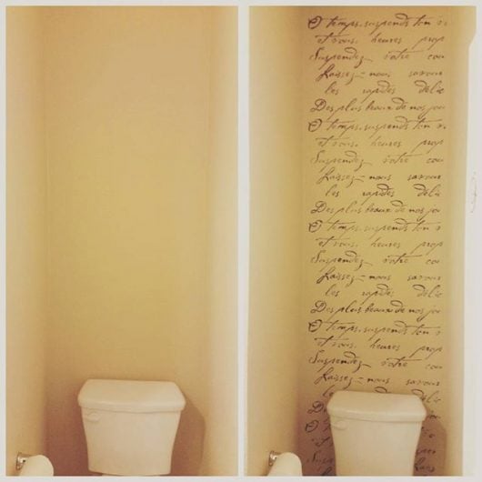 A creamy colored stenciled bathroom accent wall using the French Poem Allover Stencil from Cutting Edge Stencils. http://www.cuttingedgestencils.com/french-typography-letter-wall-stencil.html