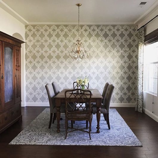 A DIY stenciled feature wall in a dining room using the Rio Allover Stencil from Cutting Edge Stencils. http://www.cuttingedgestencils.com/allover-stencil-rio.html