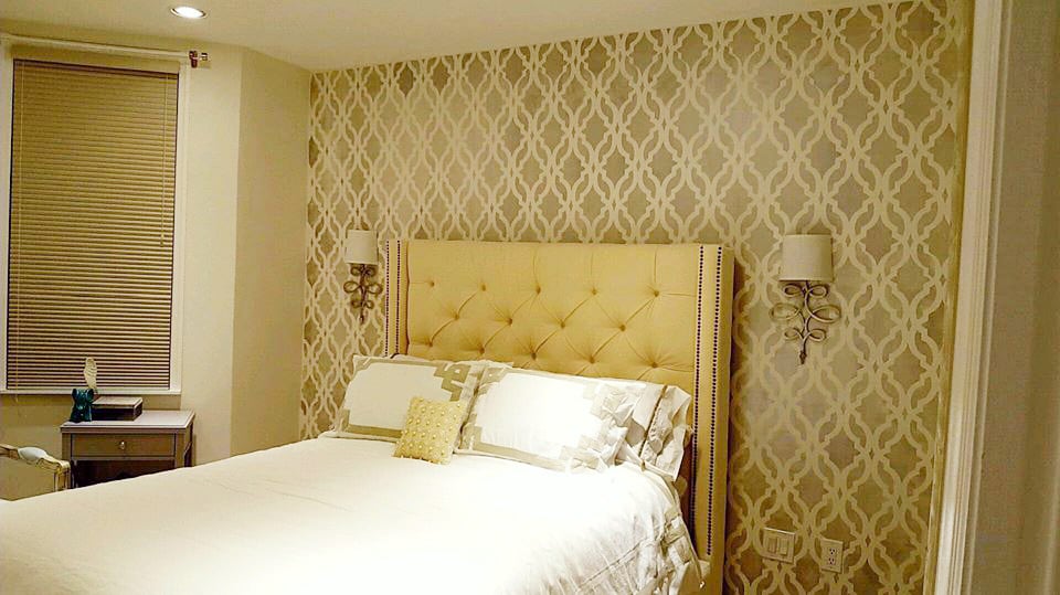 A golden yellow DIY stenciled bedroom accent wall using the Tamara Trellis Allover Stencil from Cutting Edge Stencils. http://www.cuttingedgestencils.com/tamara-trellis-allover-wall-stencils.html