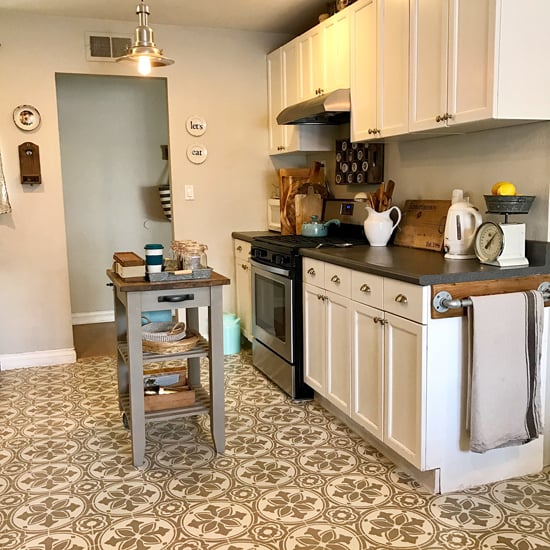 A DIY stenciled and painted linoleum kitchen floor using the Abbey Tile Stencil from Cutting Edge Stencils. http://www.cuttingedgestencils.com/Cement-tile-stencils-stenciled-floor-tiles.html