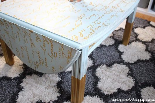 A DIY stenciled wooden coffee table using the French Poem Craft Stencil from Cutting Edge Stencils. http://www.cuttingedgestencils.com/french-poem-diy-craft-stencil-design.html