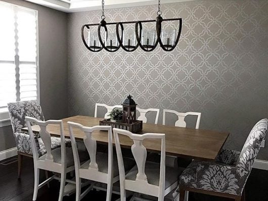 A DIY stenciled dining room metallic silver accent wall using the Sarrah Trellis Allover Stencil from Cutting Edge Stencils. http://www.cuttingedgestencils.com/sarah-trellis-stencil-moroccan-stencils-wall-pattern-design.html