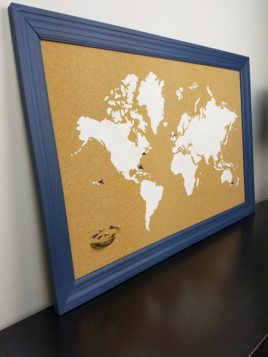 A DIY stenciled cork board using the World Map Wall Art Stencil from Cutting Edge Stencils. http://www.cuttingedgestencils.com/world-map-stencil-wall-decal-worlds-maps-stencils.html