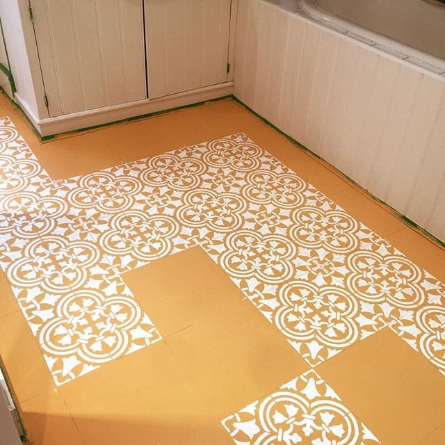 Learn how to stencil vinyl tile floor in a bathroom using the Augusta Tile Stencil from Cutting Edge Stencils. http://www.cuttingedgestencils.com/augusta-tile-stencil-design-patchwork-tiles-stencils.html