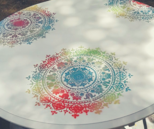 A Bohemian table makeover using the Prosperity Mandala Stencil from Cutting Edge Stencils. http://www.cuttingedgestencils.com/prosperity-mandala-stencil-yoga-mandala-stencils-designs.html