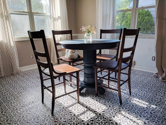 A dining room linoleum floor using the Augusta Tile Stencil from Cutting Edge Stencils. http://www.cuttingedgestencils.com/augusta-tile-stencil-design-patchwork-tiles-stencils.html