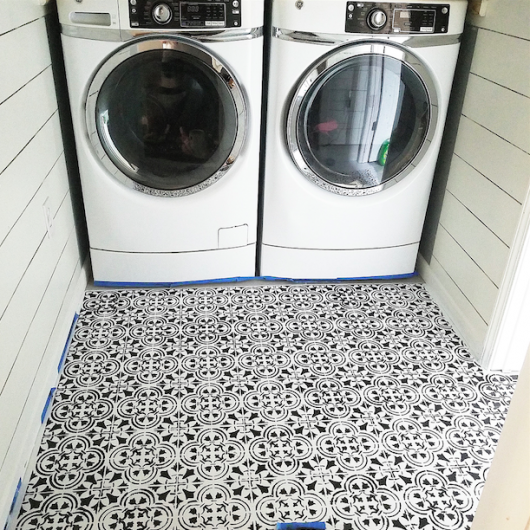 Stenciling a laundry room floor using the Augusta Tile Stencil from Cutting Edge Stencils. http://www.cuttingedgestencils.com/augusta-tile-stencil-design-patchwork-tiles-stencils.html