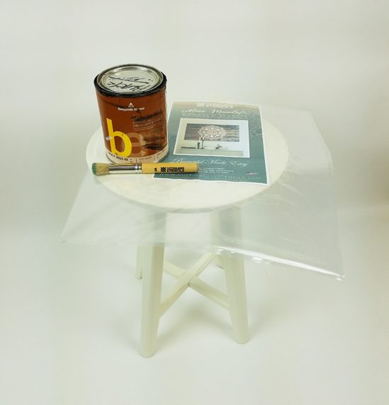 An plain white Ikea side table before its stenciled makeover. http://www.cuttingedgestencils.com/stencil-mandala-atma-medallion-deisgn-stencils.html
