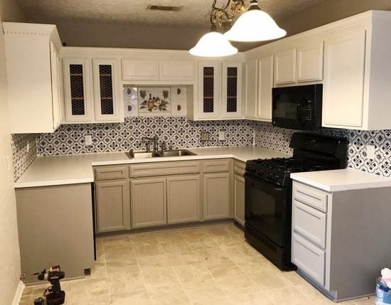 A DIY stenciled faux tile backsplash in a kitchen using the Santa Ana Tile Stencil from Cutting Edge Stencils. http://www.cuttingedgestencils.com/santa-ana-tile-stencil-spanish-tiles-cement-tile-patterns.html