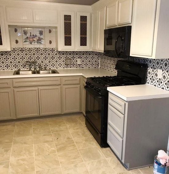 A DIY stenciled faux tile backsplash in a kitchen using the Santa Ana Tile Stencil from Cutting Edge Stencils. http://www.cuttingedgestencils.com/santa-ana-tile-stencil-spanish-tiles-cement-tile-patterns.html