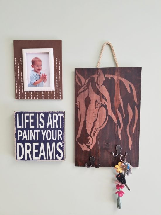 Learn how to make a DIY farmhouse key holder using the Horse Head Stencil from Cutting Edge Stencils and reclaimed wood. http://www.cuttingedgestencils.com/horse-stencil-horse-head-wall-stencils-decal.html
