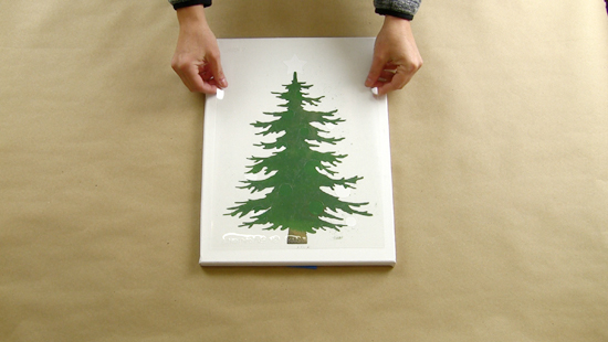 Learn how to make DIY light up Christmas Tree artwork using a craft stencil from Cutting Edge Stencils. http://www.cuttingedgestencils.com/christmas-tree-stencil.html