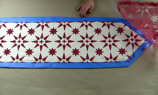 Learn how to stencil a DIY table runner using the Jewel Tile Stencil from Cutting Edge Stencils and Jacquard Fabric Paint in Ruby Red. http://www.cuttingedgestencils.com/jewel-tile-stencil-cement-tiles-stencils.html