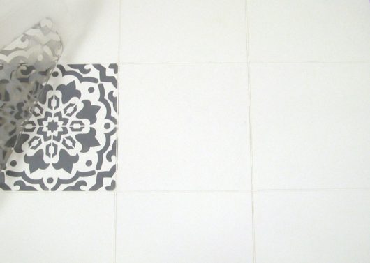 Learn how to stencil a faux tile floor using the Amalfi Tile Stencil from Cutting Edge Stencils. http://www.cuttingedgestencils.com/amalfi-tile-stencil-Cement-tiles-stenciled-floor-backsplash.html