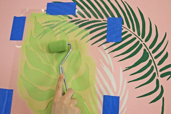 painting the tropical all using palm fronds stencil