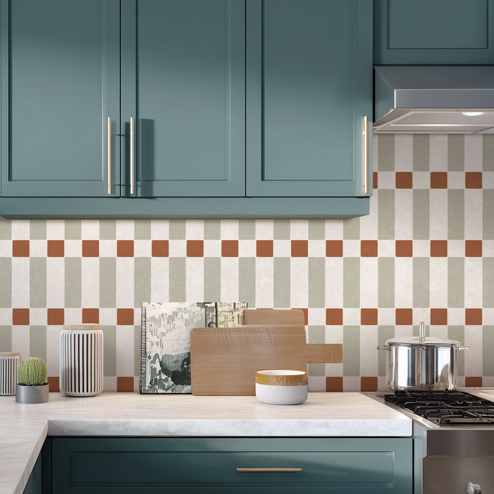 Modern kitchen with teal cabinets and a stenciled checkered backsplash