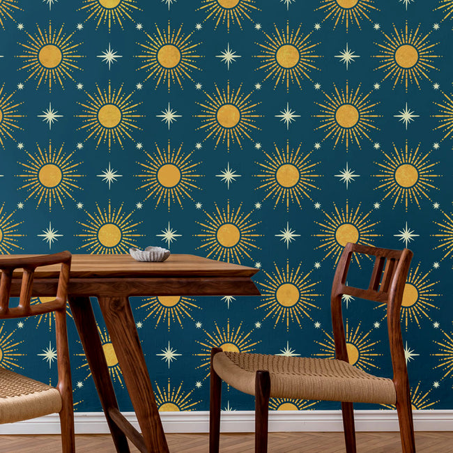 celestial stencil on a dark blue wall