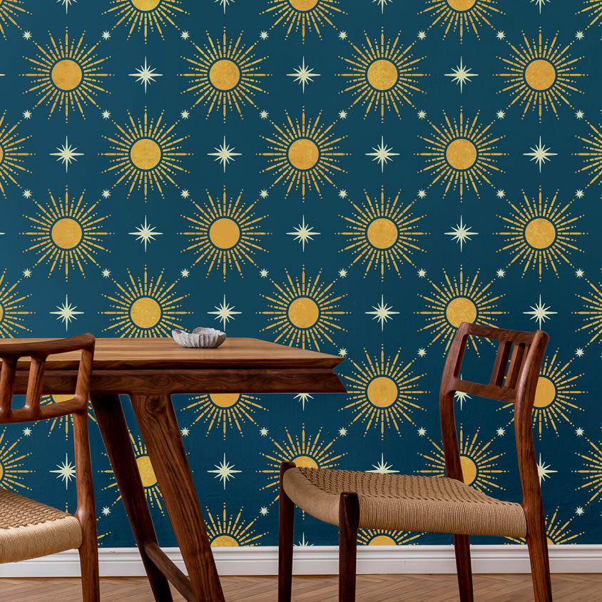 celestial stencil on a dark blue wall