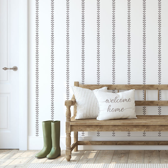 tan country cottage stripe stencil on white walls in entryway