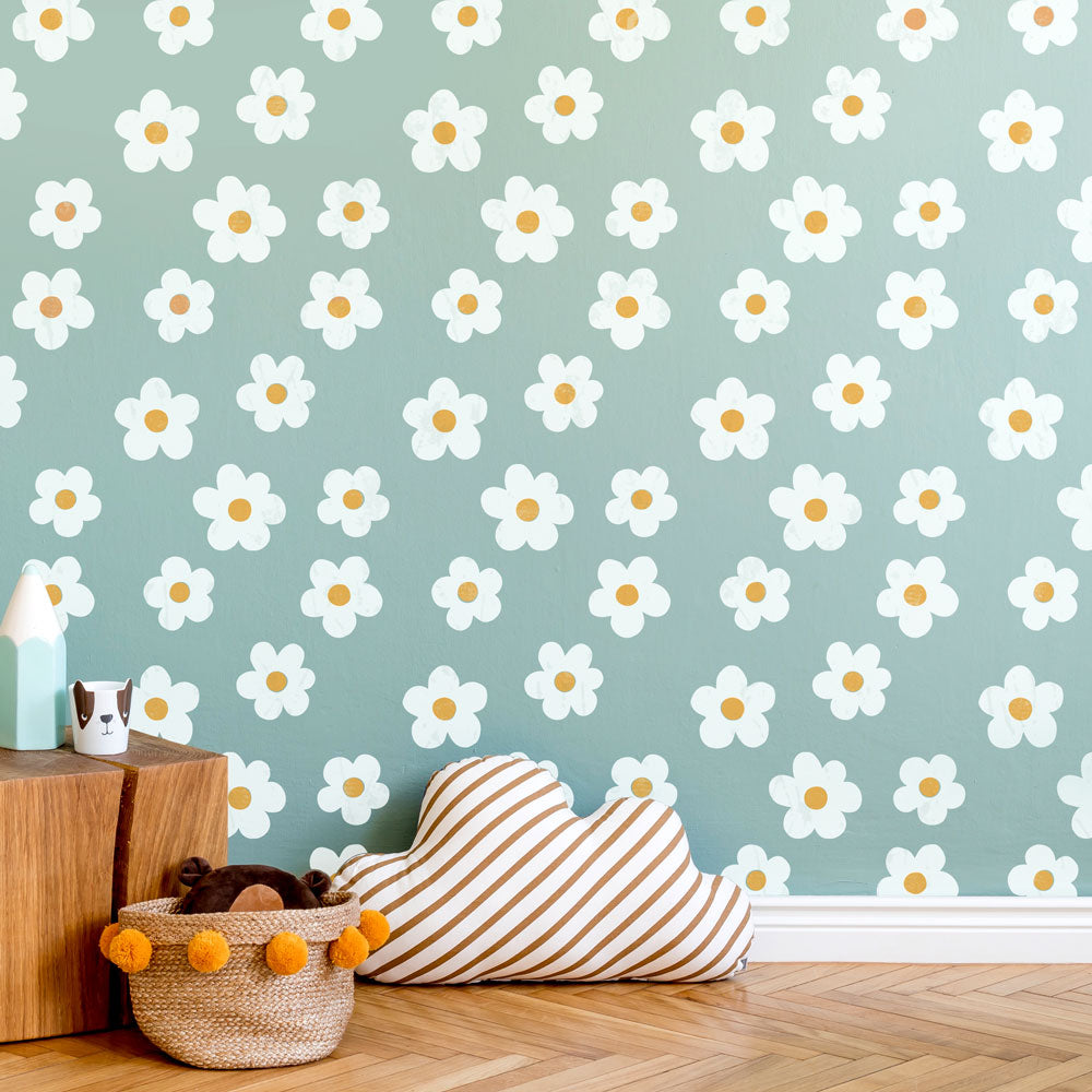blue playroom wall with white daisy dream flower stencil