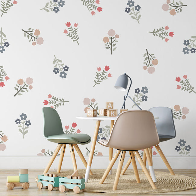 colorful flower stencil kit on white wall for stenciling