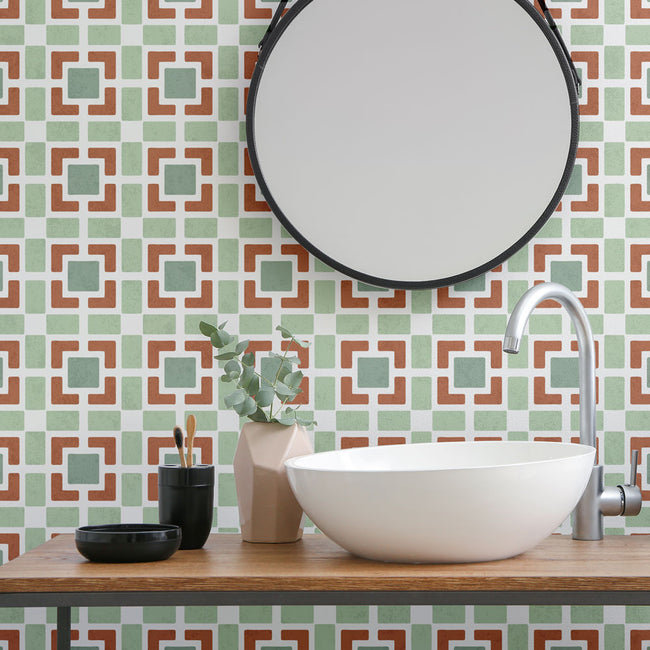 geometric wall stencil pattern on a bathroom wall