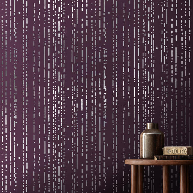 Wall stencil with vertical line pattern on a purple background